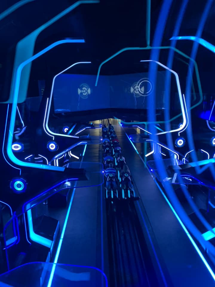 Looking down on the Tron ride cars